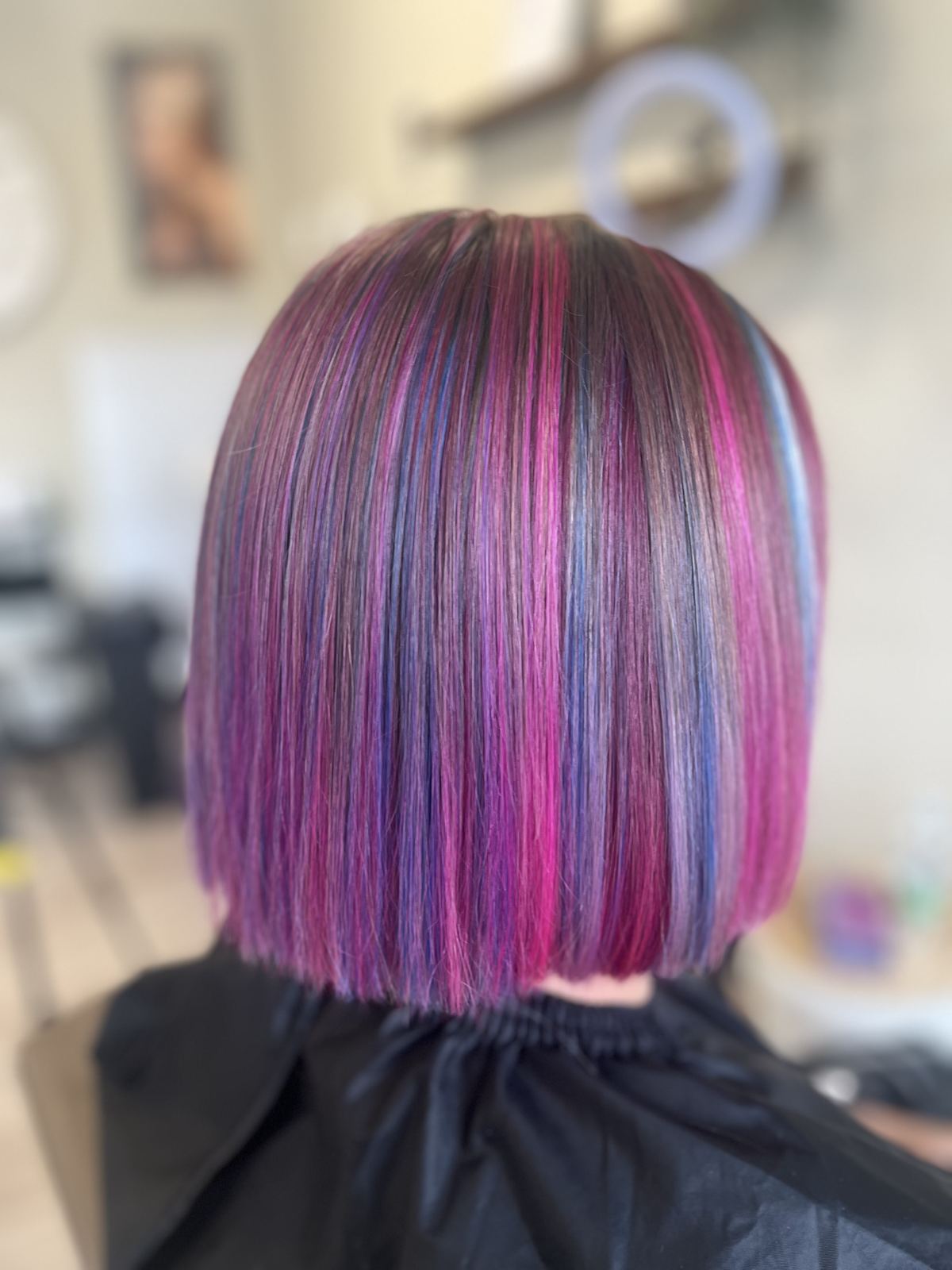Pink and purple vivid bob haircut