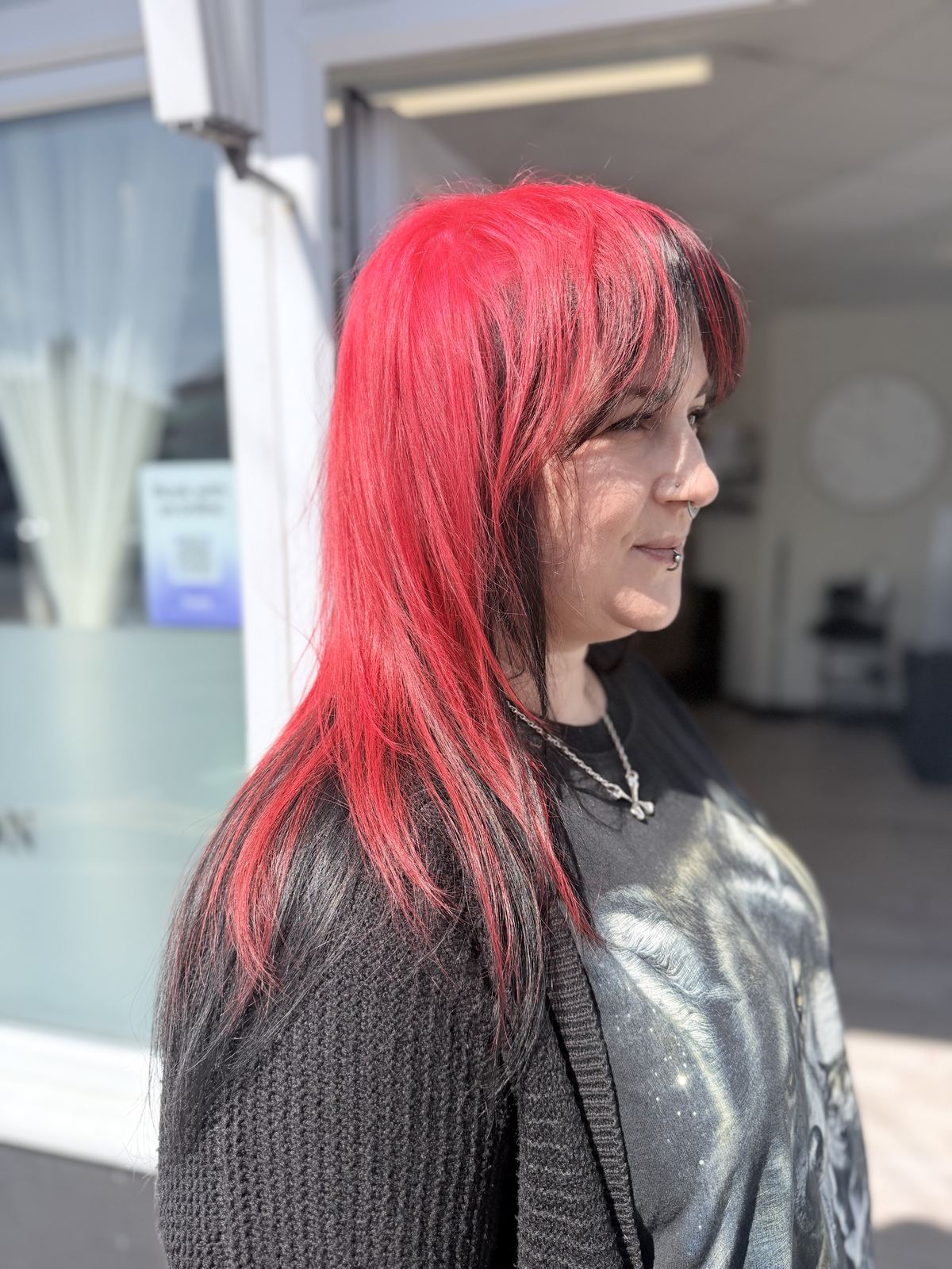 Bright red vivid hair with layered fringe