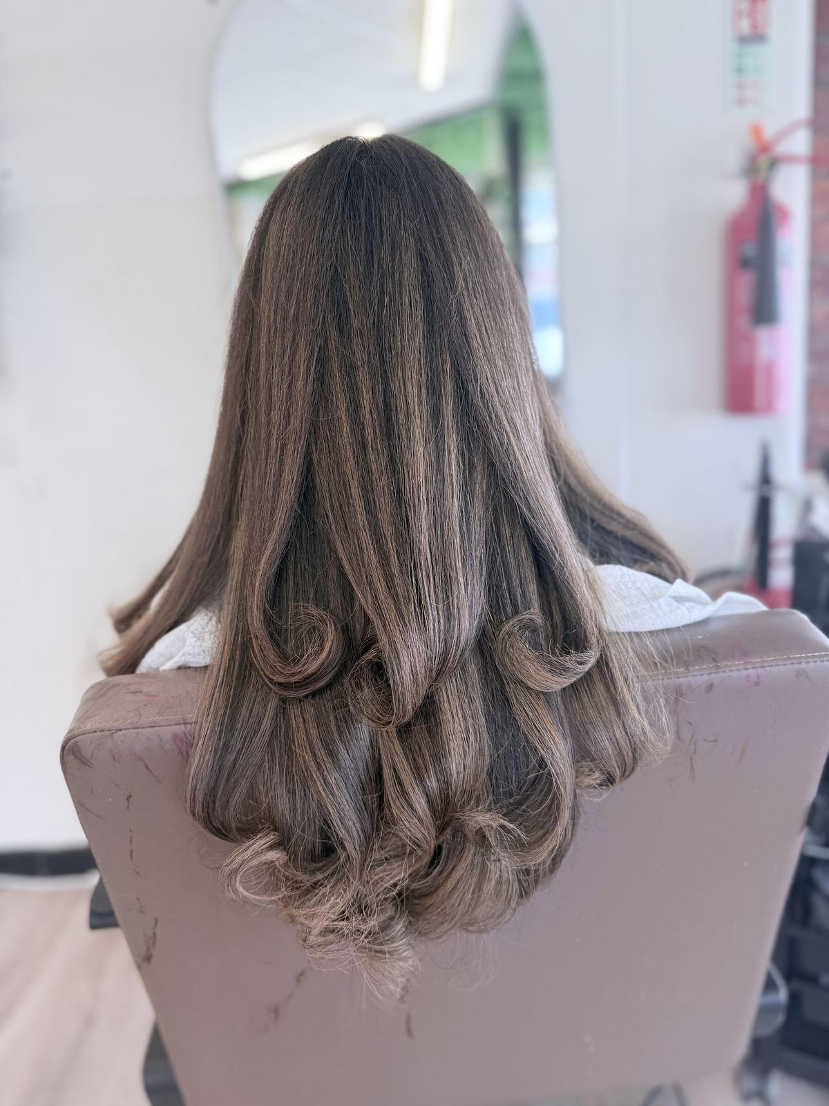 Long brunette hair with soft dimensional ends